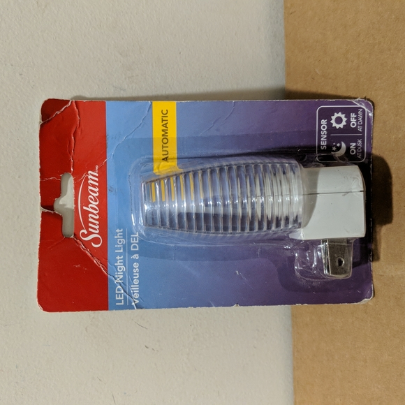 3/$15.00 SUNBEAM LED AUTOMATIC SENSOR NIGHT LIGHT NEW - Picture 1 of 2